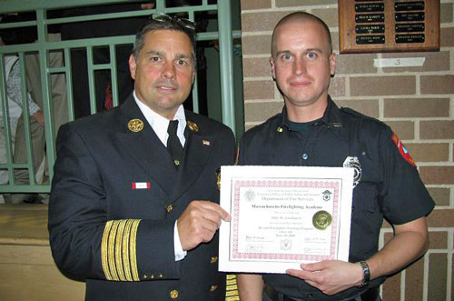 Firefighter Dale Goodspeed with Fire Chief John Mauro Jr.