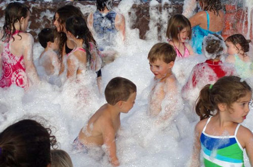 Kids enjoying the Bubble Romp at Summer Nights (photo courtesy of the Recreation Department)