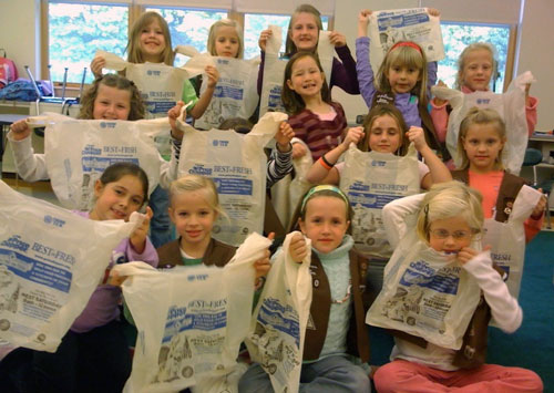 Brownie Troop #2770 preparing bags for the 2009 Scouting for Food Drive (contributed photo)