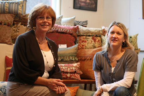 Ruth Flynn (left) and Betsy Walter (right) with their decorative pillows