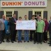 Pictured (from left to right): Dunkin’ Donuts Franchisee Konse Scrivanos; Dunkin’ Donuts General Manager Anita Houle; Dunkin’ Donuts Franchisee Neal Faulkner; Bradley; Xander; Luke; Chief Development Officer for NECC Jared Bouzan; Mike; Development Coordinator for NECC Heather Fortin; Dunkin’ Donuts Franchisee and Co-chair of The DDBRCF Northeast Chapter, Benny Omid; Director of Development for NECC Joseph Ziska.