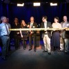 Palley cuts the ribbon, joined by SAM staff, Trottier Principal Keith Lavoie, Superintendent Johnson, Rep. Dykema, and Selectman Paul Cimino