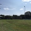 New light poles are installed at Choate Field (photo by Beth Melo)