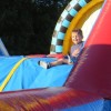 Inflatable obstacle courses make kids smile (by Beth Melo)