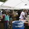 In 2011, dozens of volunteers turned up to help box tons of donations for overseas troops. (photo by Susan Fitzgerald)