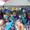 Girl Scout troops are among the many community organizations raising funds on the field (photo of Troop 89255 by Joao Melo)