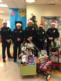 Southborough Police Department donating gifts to Tufts Medical