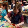 Neary students ( Abbe Or, Therese Moore, Rosey Gebauer, and Scott Cronin from Mrs. Martinez's 4th grade class) paint "Hope Sticks"