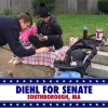 Politician Geoff Diehl shaking hands and greeting babies from Facebook