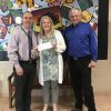 Trottier Principal Kieth Lavoie recieves check from Rotary's president Christine Narcisse and volunteer Carl Guyer