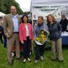 At a past Heritage Day, our state Senator and Representative posed with one of the many community organizations looking to raise awareness through its tent (from Facebook)