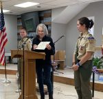 Ariella Zalev looks on as Southborough Select Board member Marguerite Landry presents new Eagle Scout Cass Melo with a certificate on behalf of the Town. (contributed photo)
