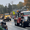 Big trucks in the parade by Michael Melo