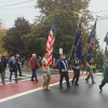 HD veterans and officials march at the front of the parade by Michael Melo