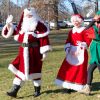 Greeting the crowd at 2024 Southborough Santa Day (photo by Owen Jones Photo)