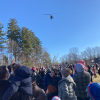 Spotting Santa's helicopter at 2024 Santa Day (photo by Beth Melo)